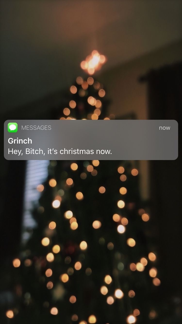 A Christmas tree with a text message from the Grinch. - Christmas iPhone