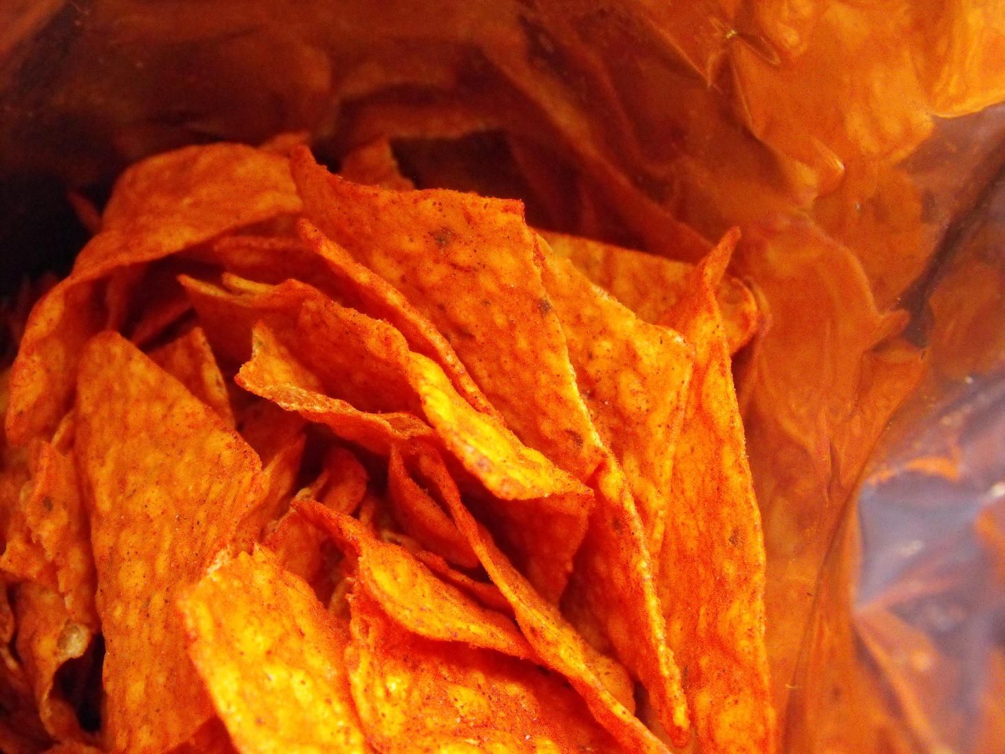 A bag of red tortilla chips - Doritos