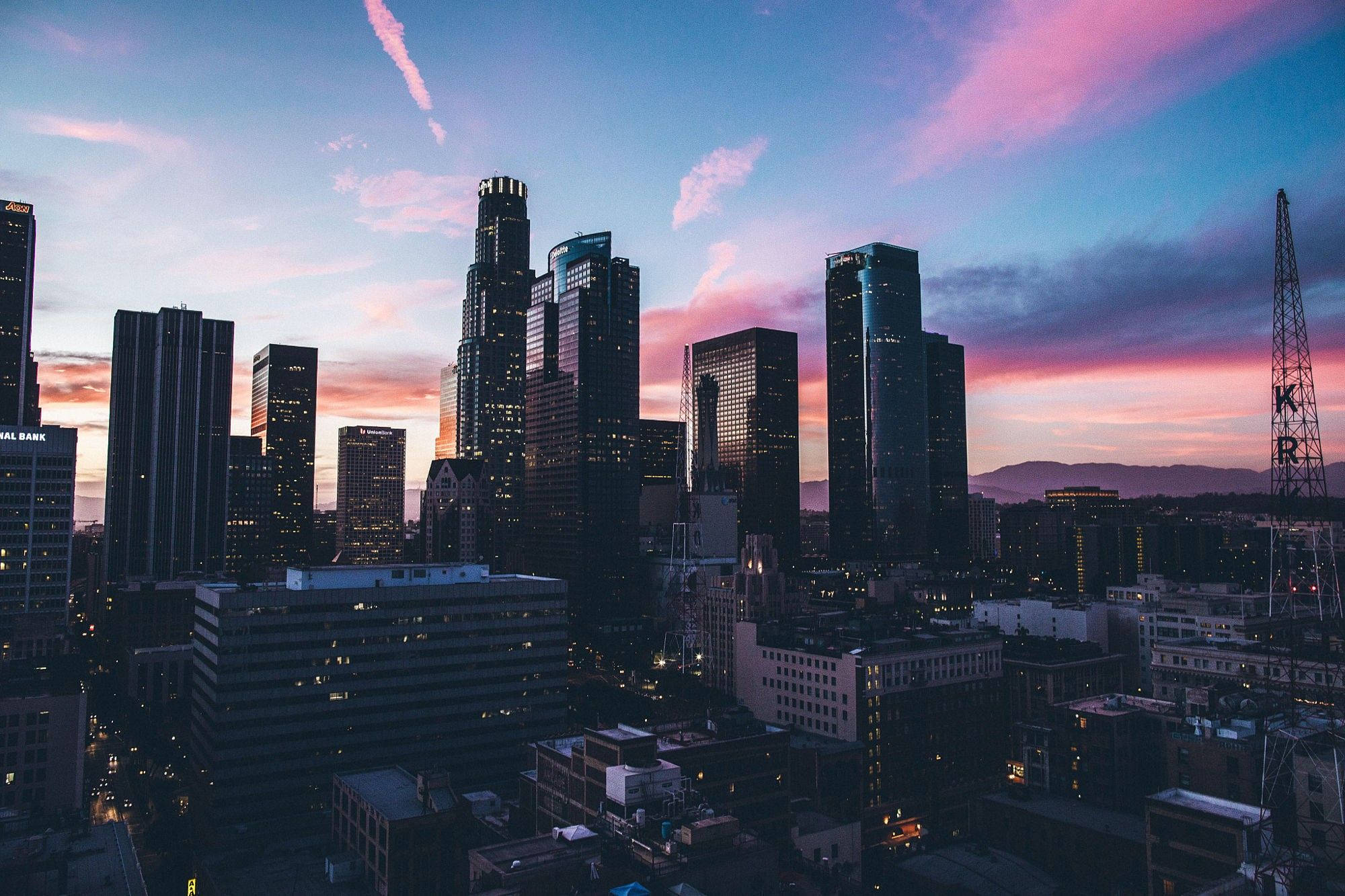 A city skyline at sunset with buildings and skyscrapers - Los Angeles