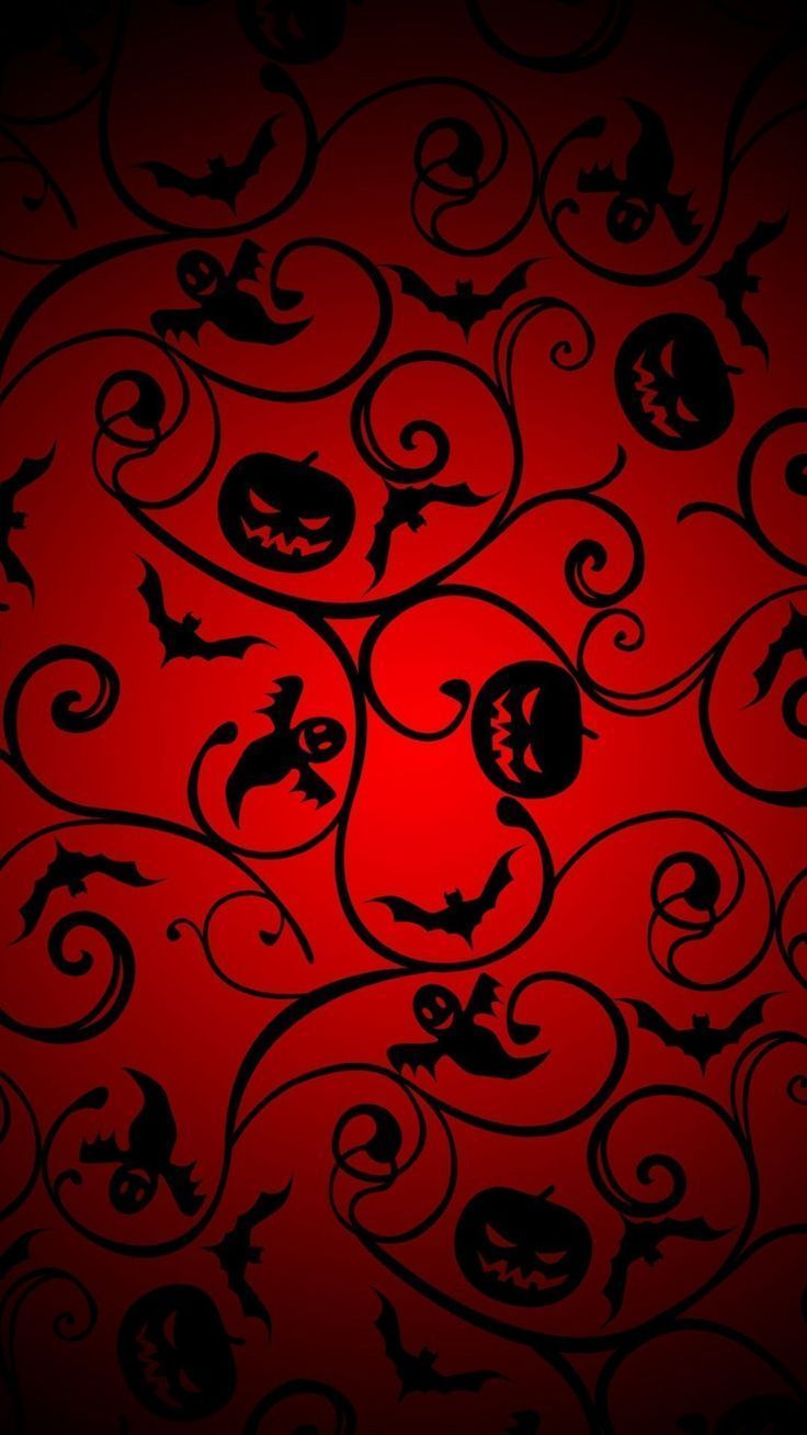 A red Halloween wallpaper with black bats, cats, and pumpkins. - Spooky