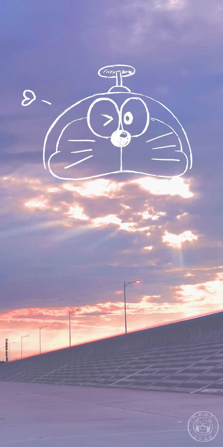 Aesthetic wallpaper for phone of a sunset with哆啦A梦's head - Doraemon