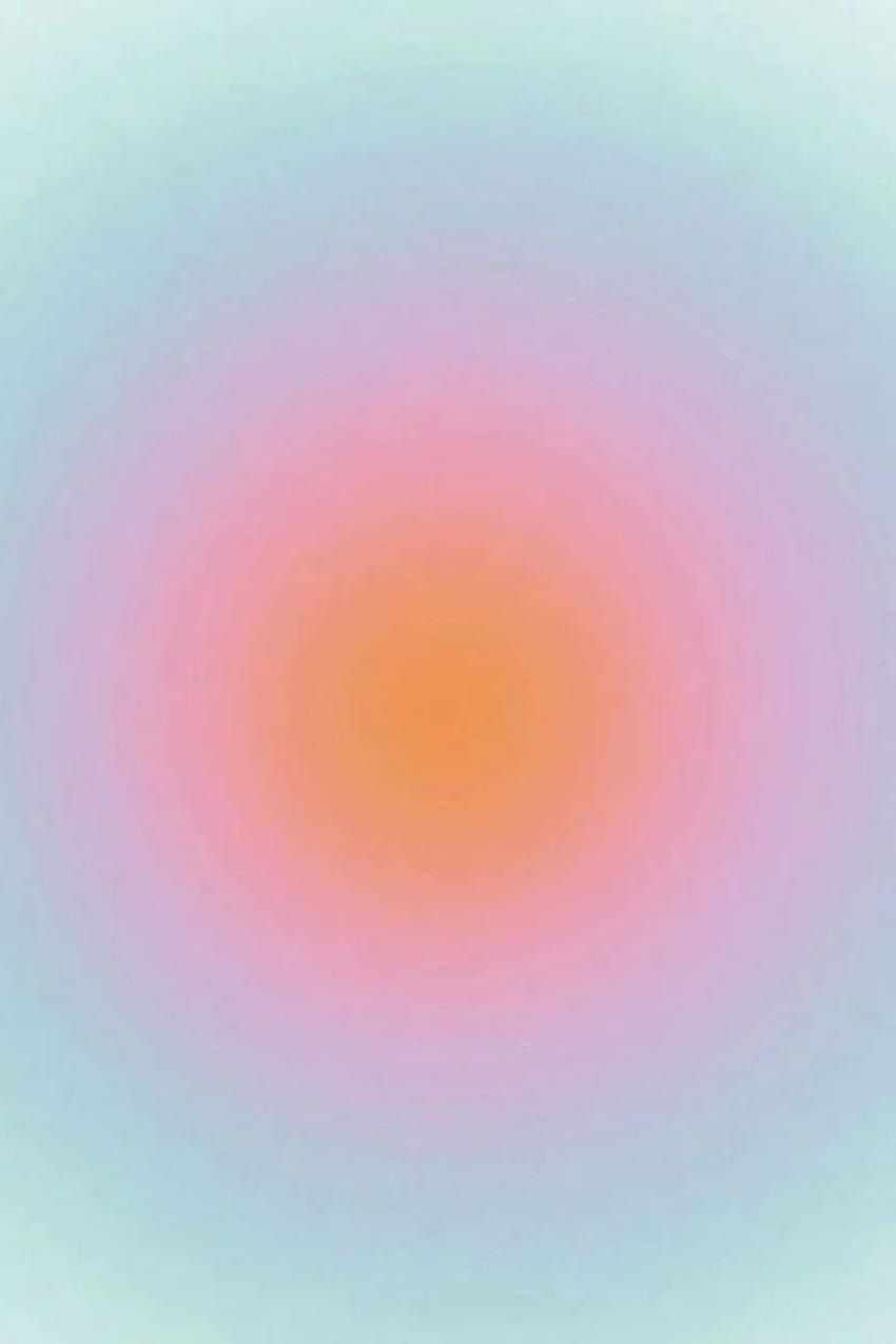 An abstract image of a gradient of pink and orange against a blue background - Danish