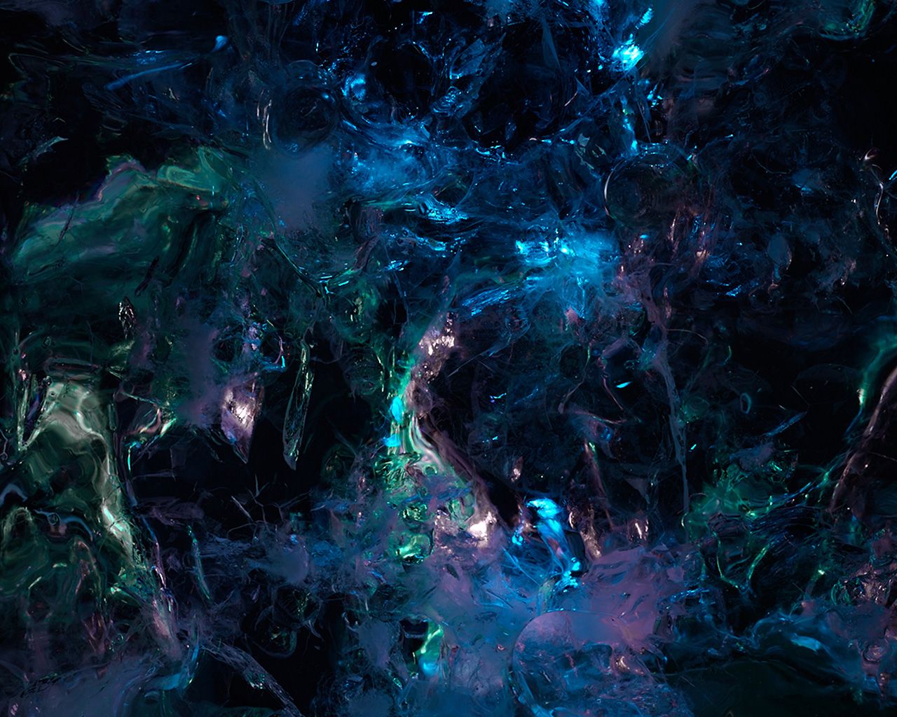 A close-up of a black, blue and green abstract painting - Grunge