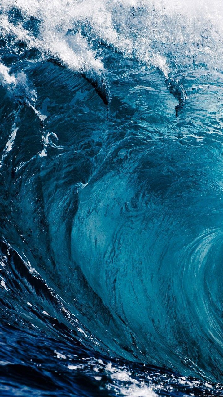 A large wave in the ocean with white and blue colors. - Underwater, ocean