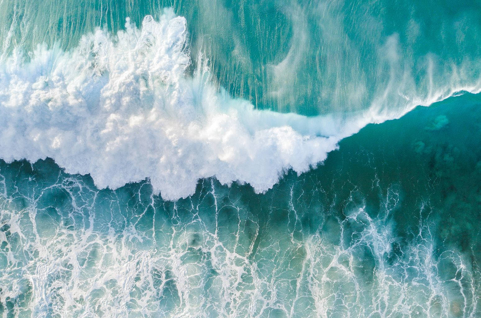 Aerial view of a breaking wave - Ocean