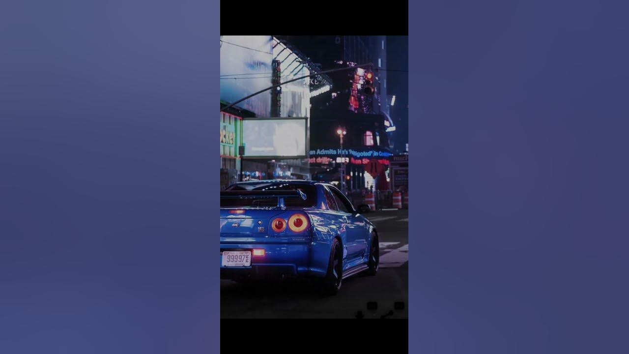 Nissan skyline gtr r34 blue on the city street - Nissan Skyline