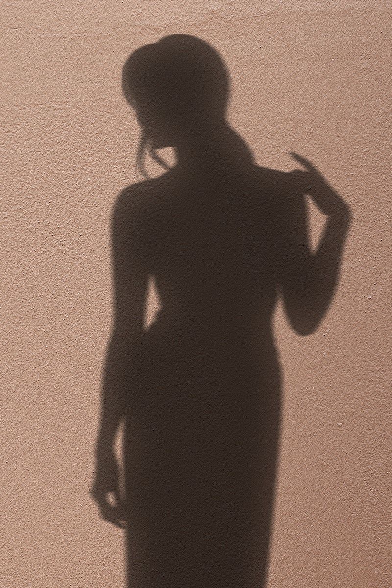 Shadow of a woman on a wall - Shadow