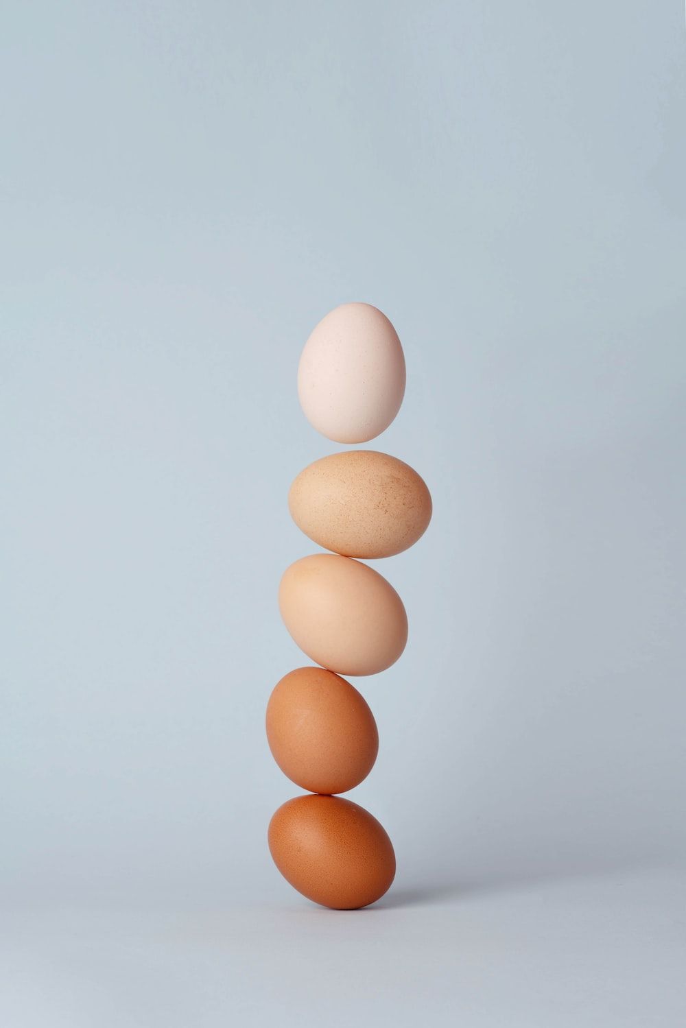 A stack of eggs on top each other - Egg