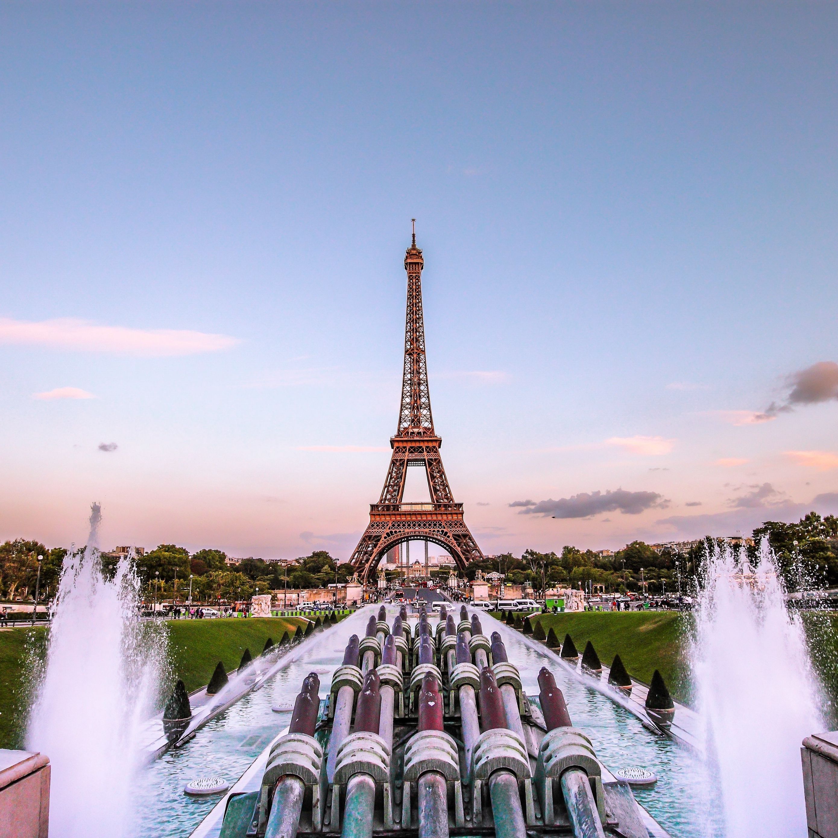 A beautiful view of the Eiffel Tower with a fountain in the foreground. - Eiffel Tower
