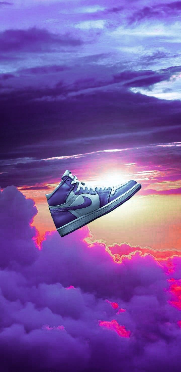 A pair of sneakers floating in the clouds - Air Jordan