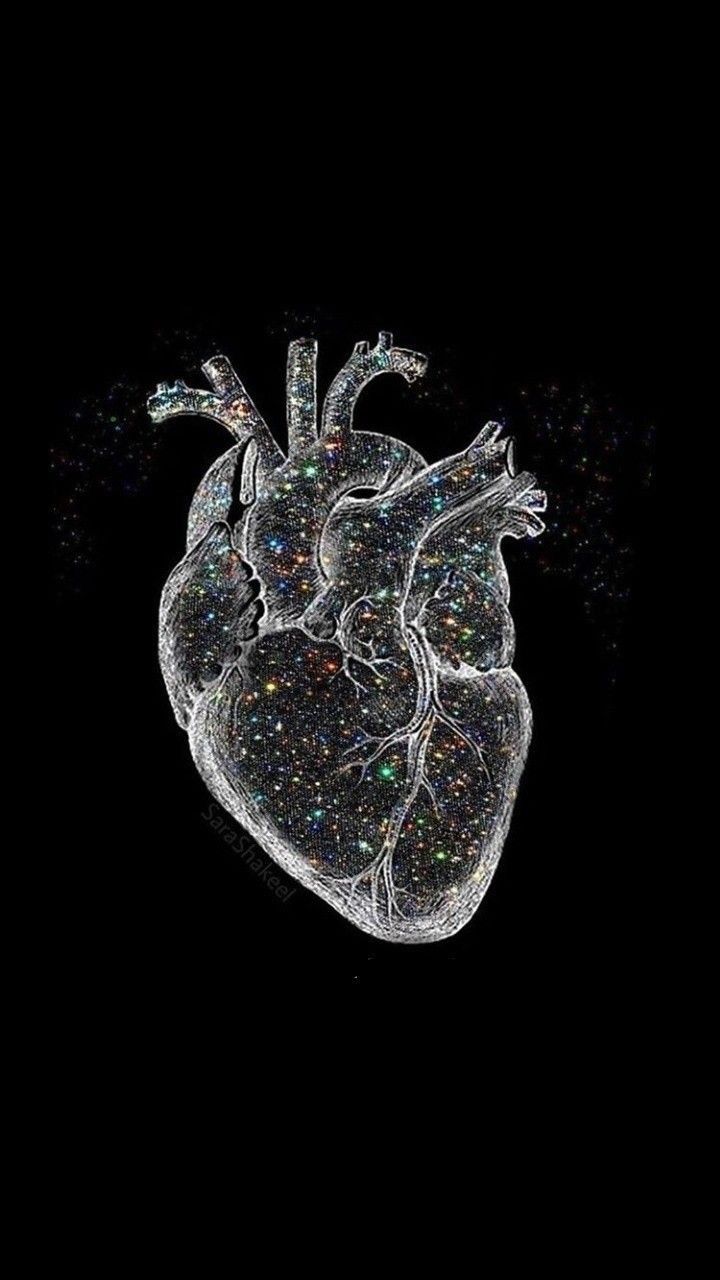 A heart made of glitter on black background - Anatomy