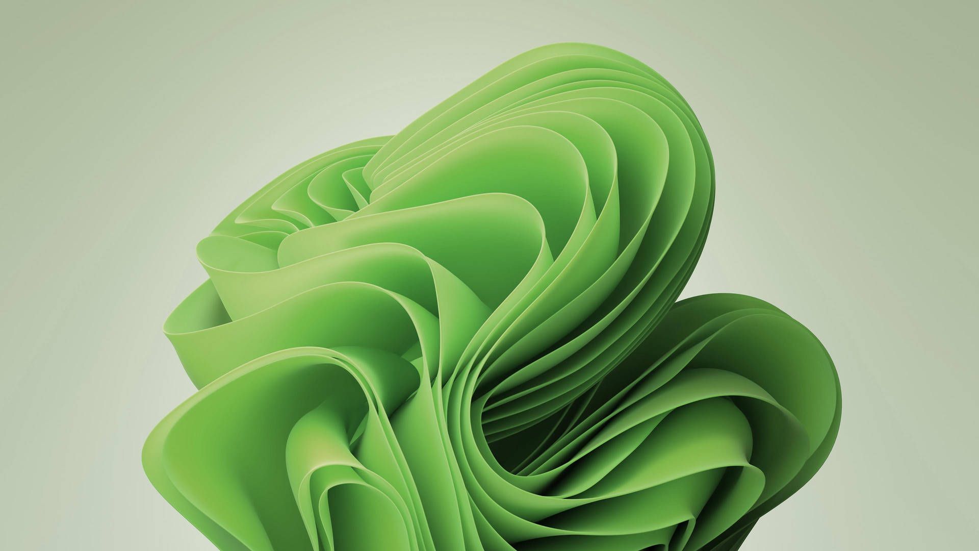 A green abstract wallpaper made of paper - Windows 11