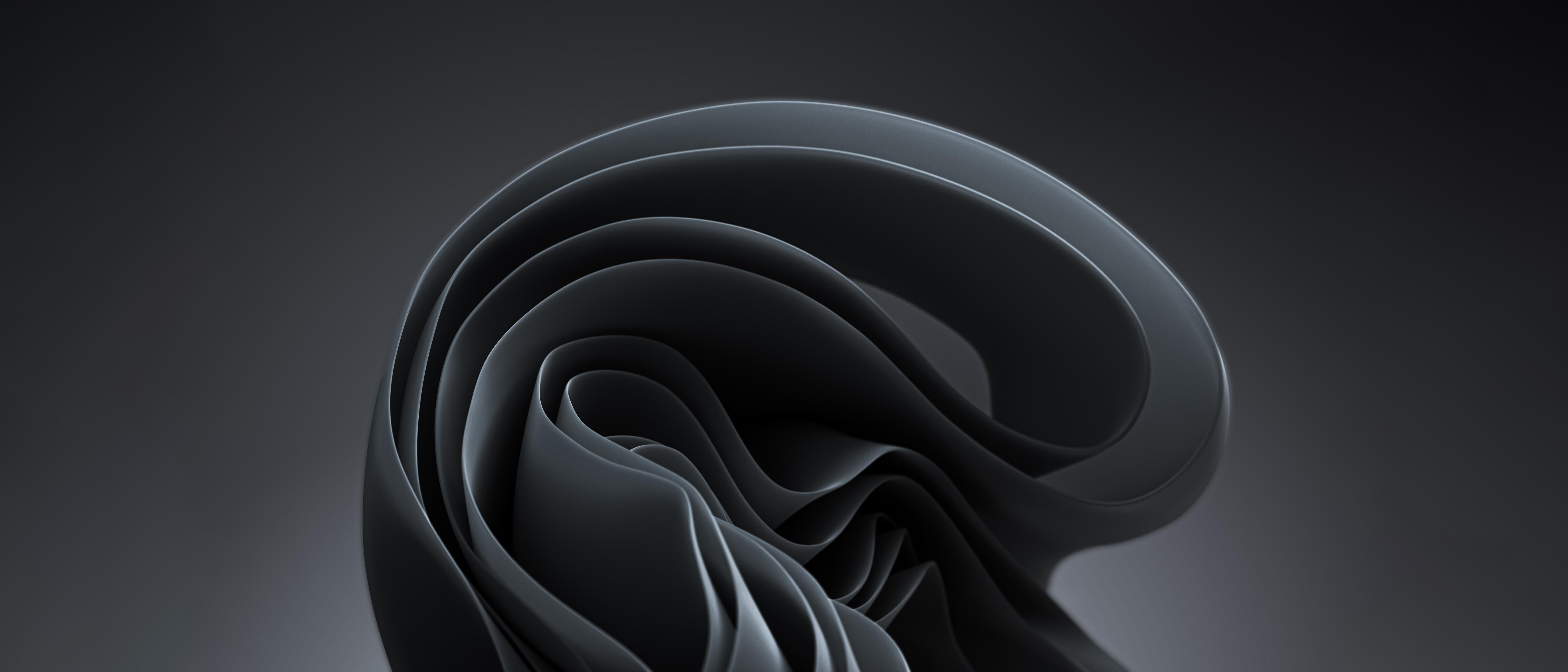 A 3D abstract shape with a dark grey background - Windows 11