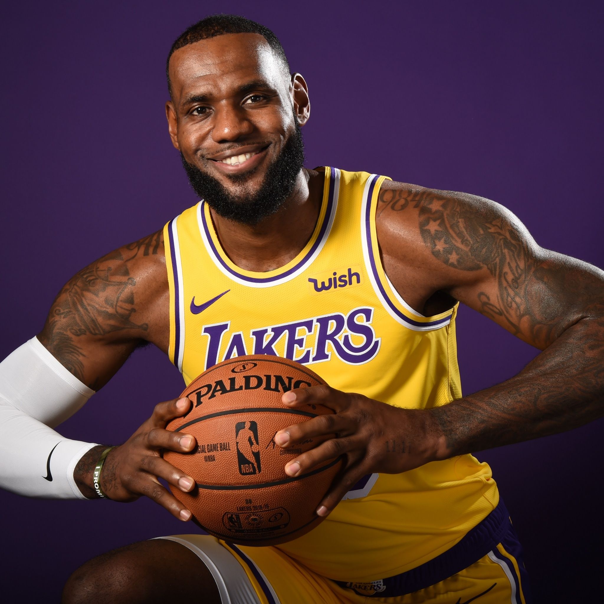 LeBron James poses for a photo in his Lakers jersey. - Los Angeles Lakers, Lebron James