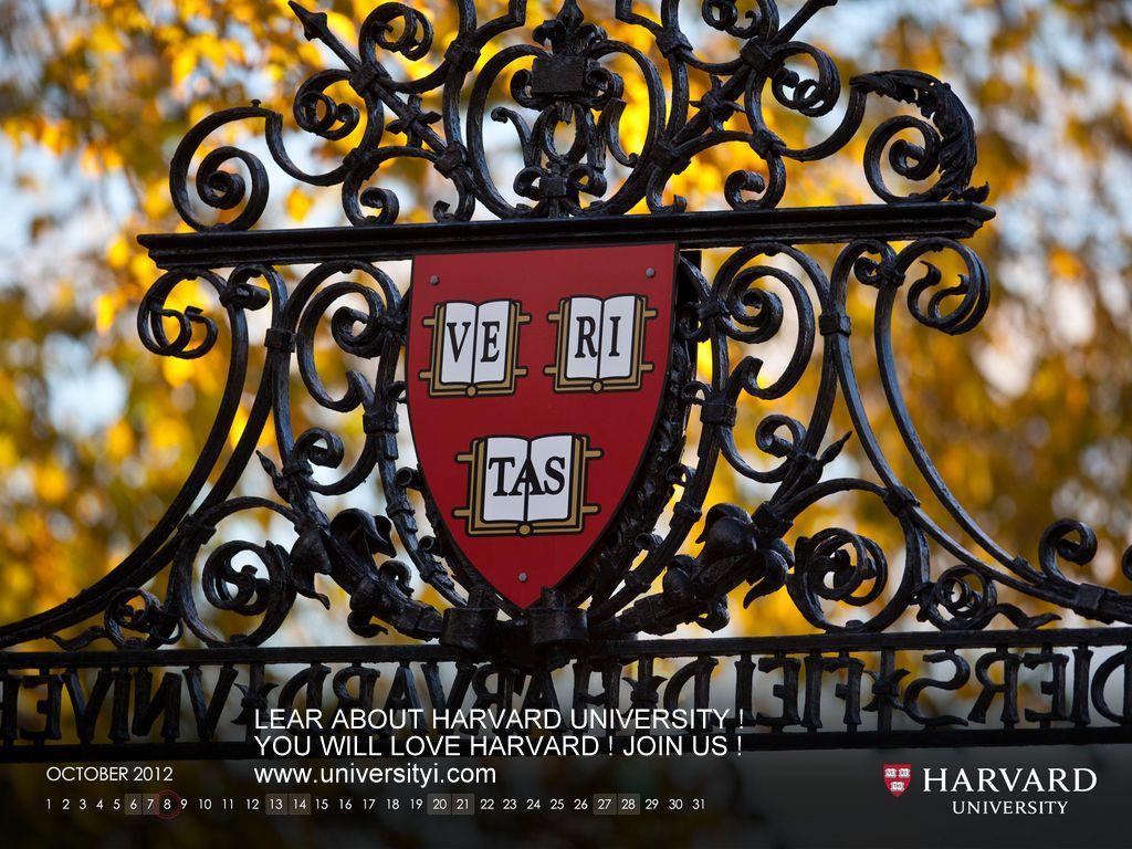 The Harvard logo on a gate with the words 