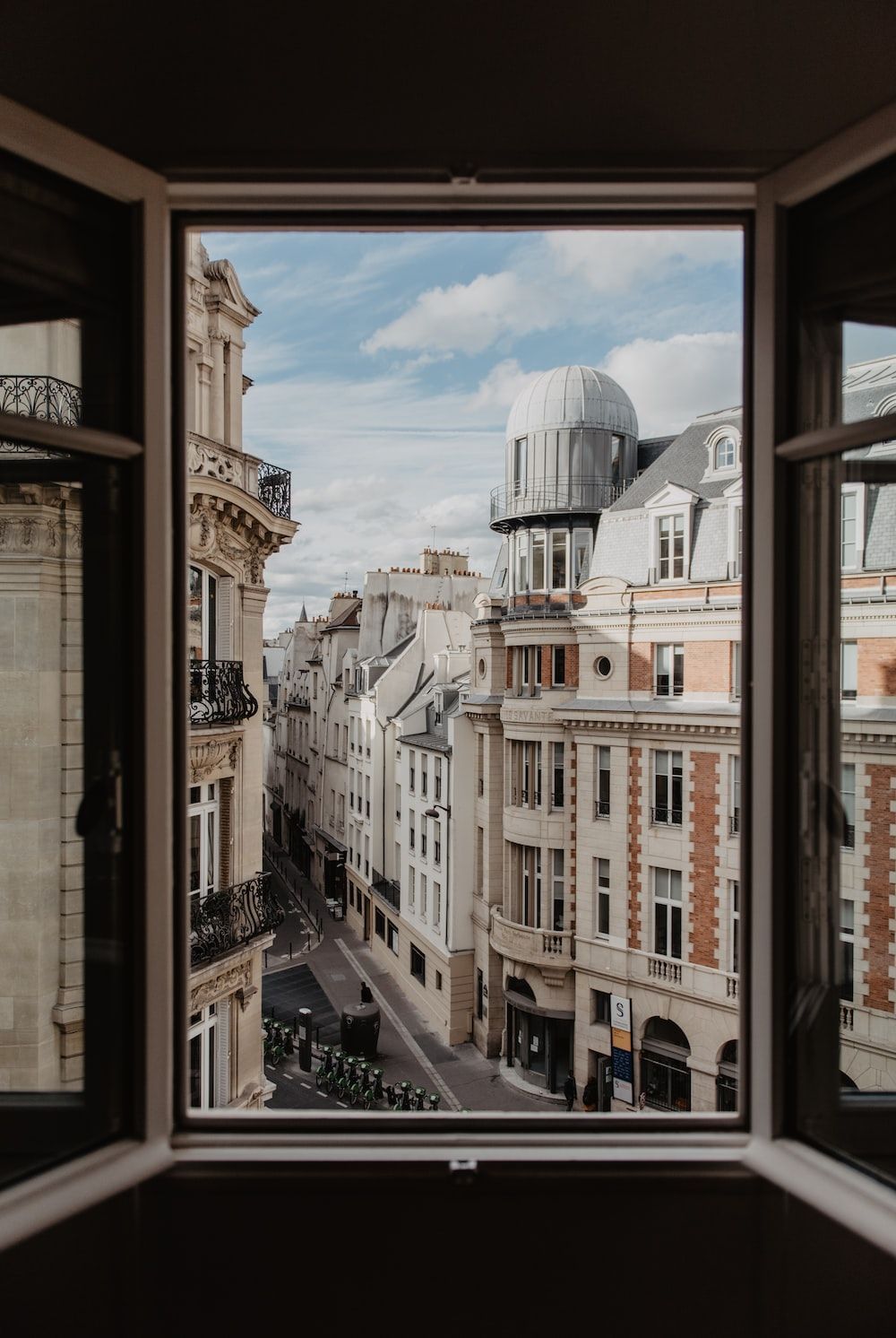 A window looking out onto a Parisian street - France
