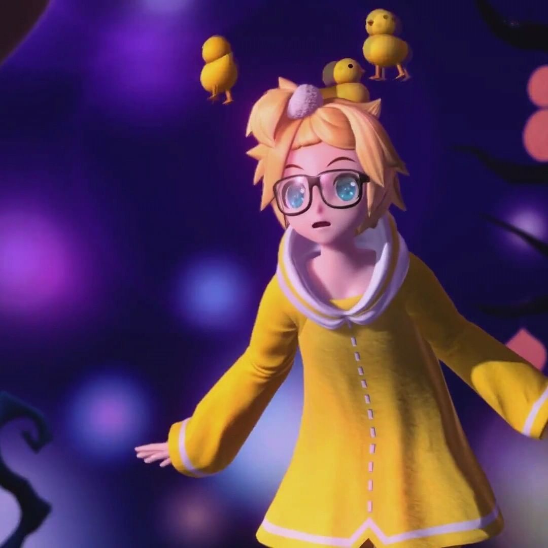 A girl with yellow hair and a yellow jacket with white trim is standing in a purple room with little yellow chicks on her head. - 