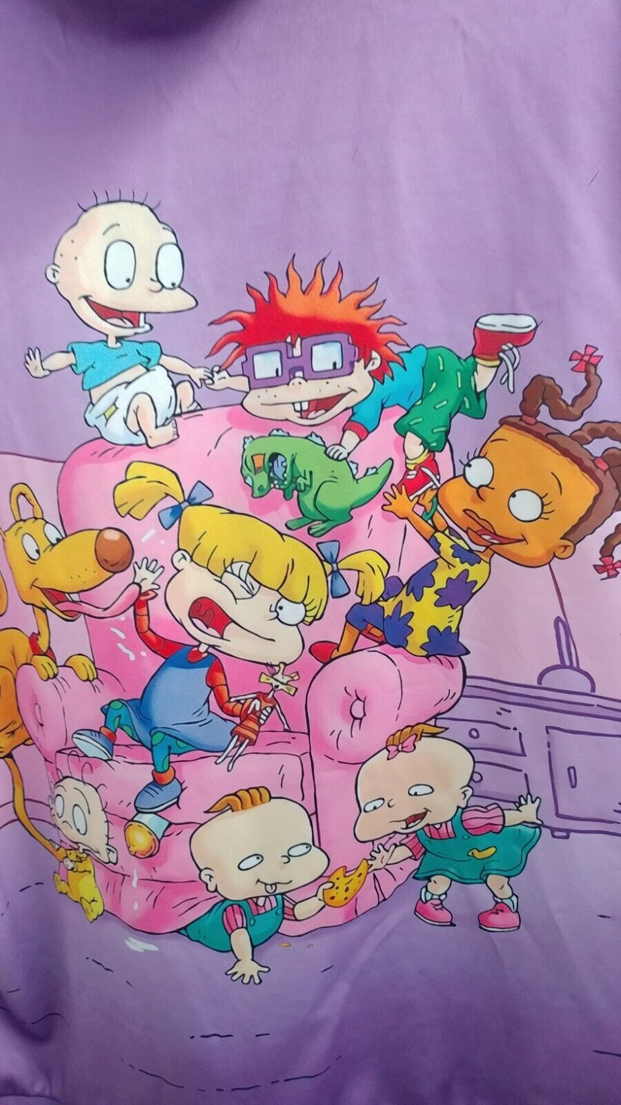 The rugrats are all on the couch together - Rugrats