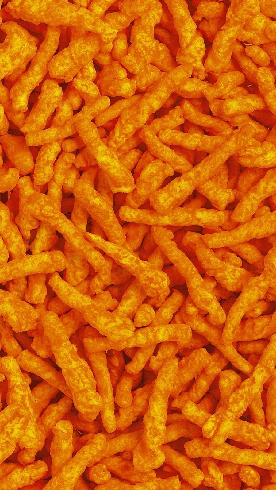 Cheetos are a popular snack food made from cheese-flavored, orange cheese puffs. - Cheetos