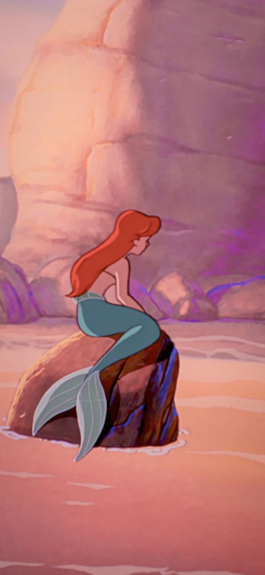 The little mermaid sitting on a rock in an animated scene - Ariel