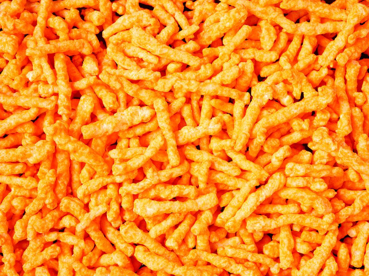 A close up of the famous Hot Cheetos snack food - Cheetos