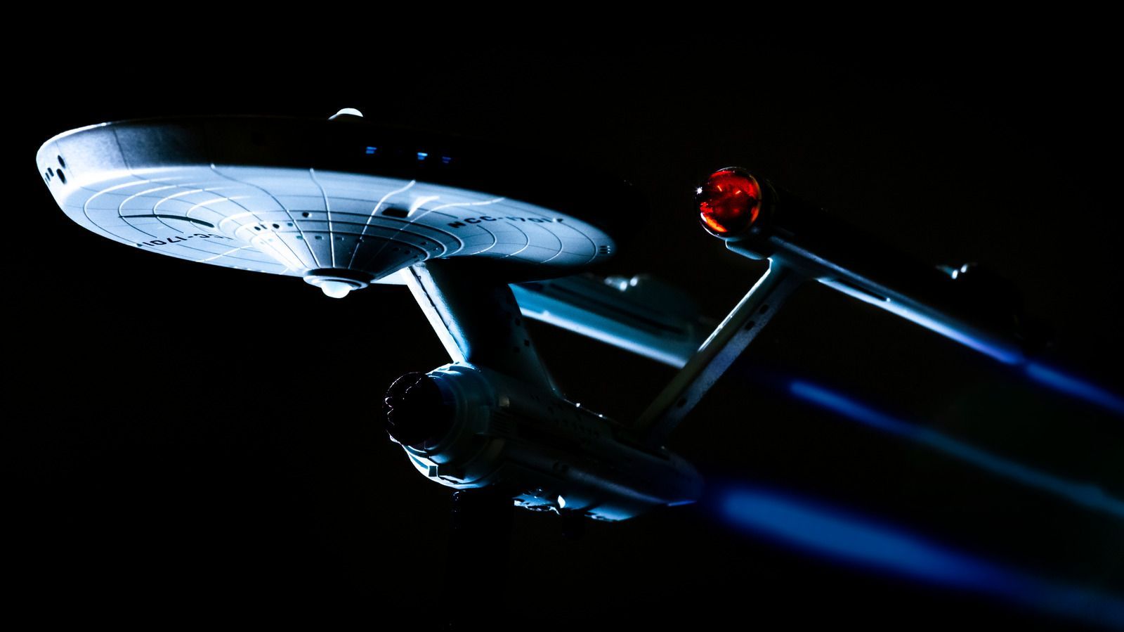 A spaceship is flying in the dark - Star Trek