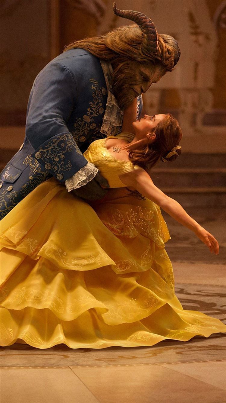 A woman in yellow dress is dancing with the beast - Dance, Belle