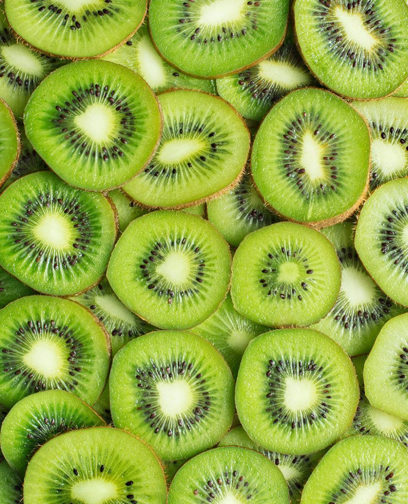 A pile of sliced kiwi fruit - Kiwi