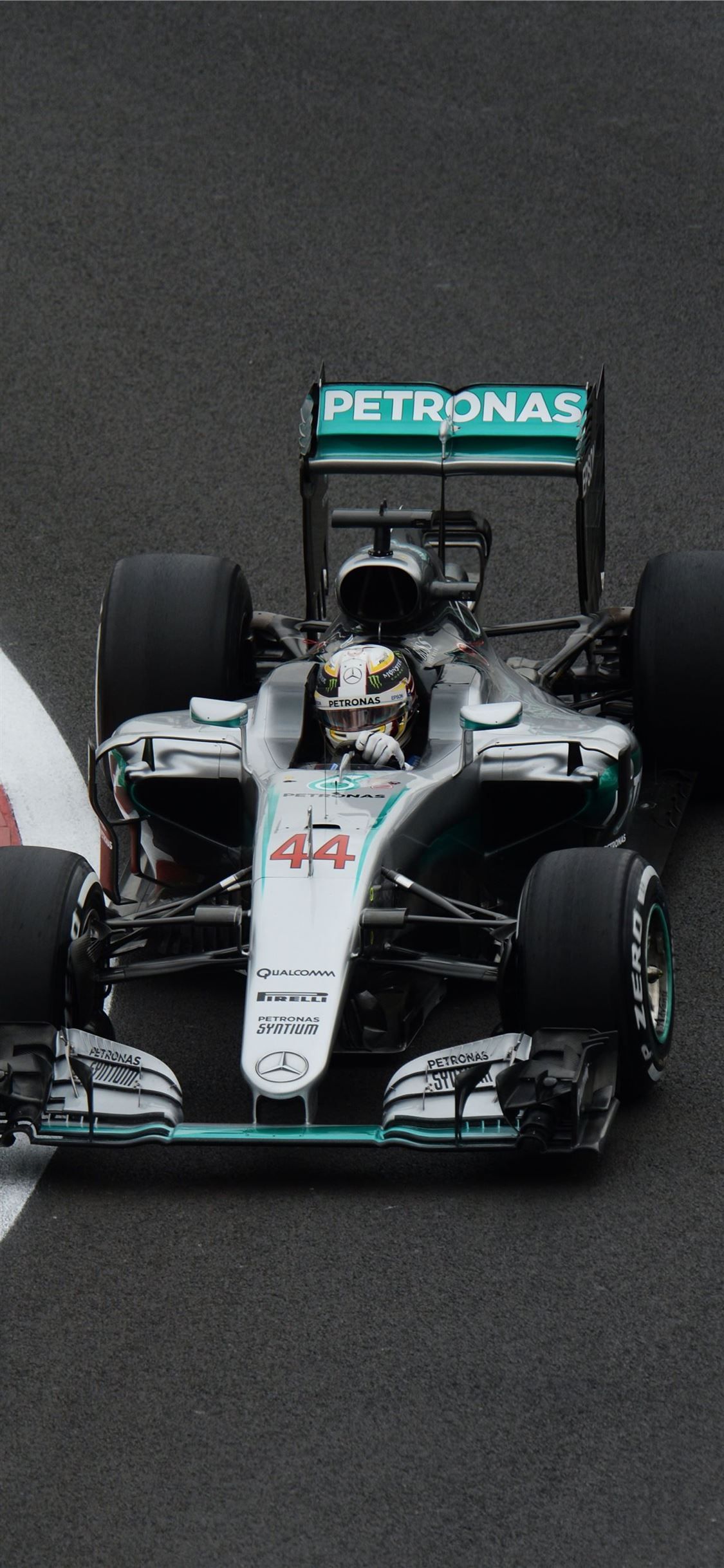 Lewis Hamilton in his Mercedes Formula 1 car on the track - Lewis Hamilton