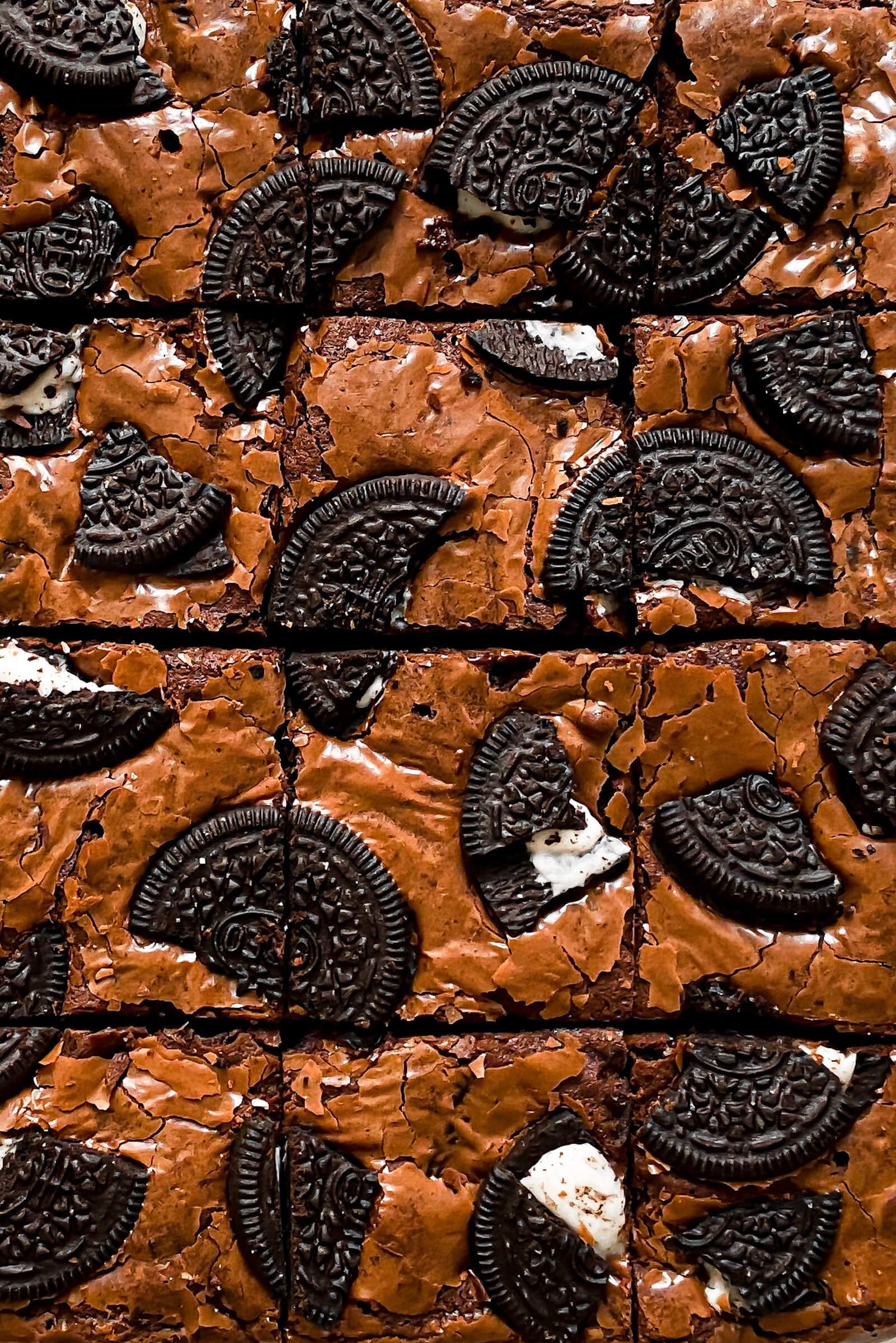 An overhead shot of a batch of fudgy Oreo brownies cut into squares. - Oreo