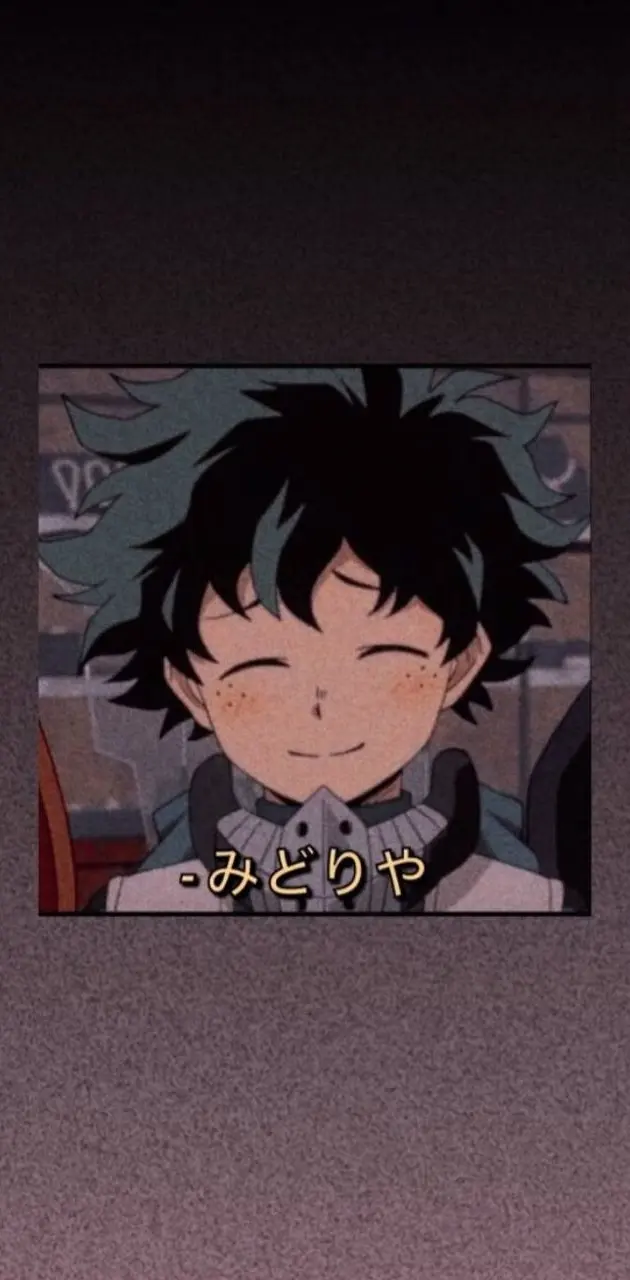 Anime boy with black hair and freckles, smiling and squinting his eyes - Deku