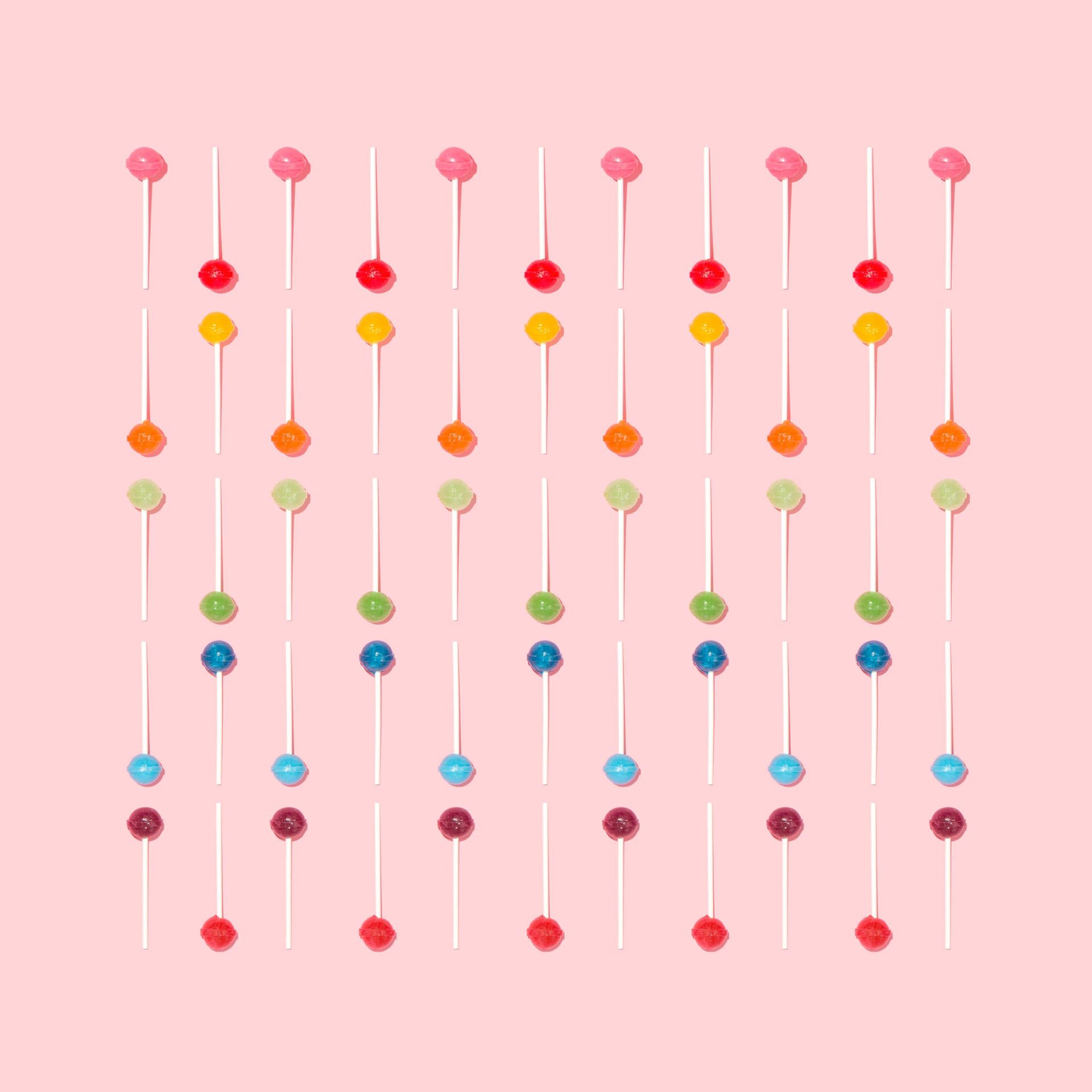 Download Caption: Vibrant Lollipop Aesthetic Pattern Wallpaper