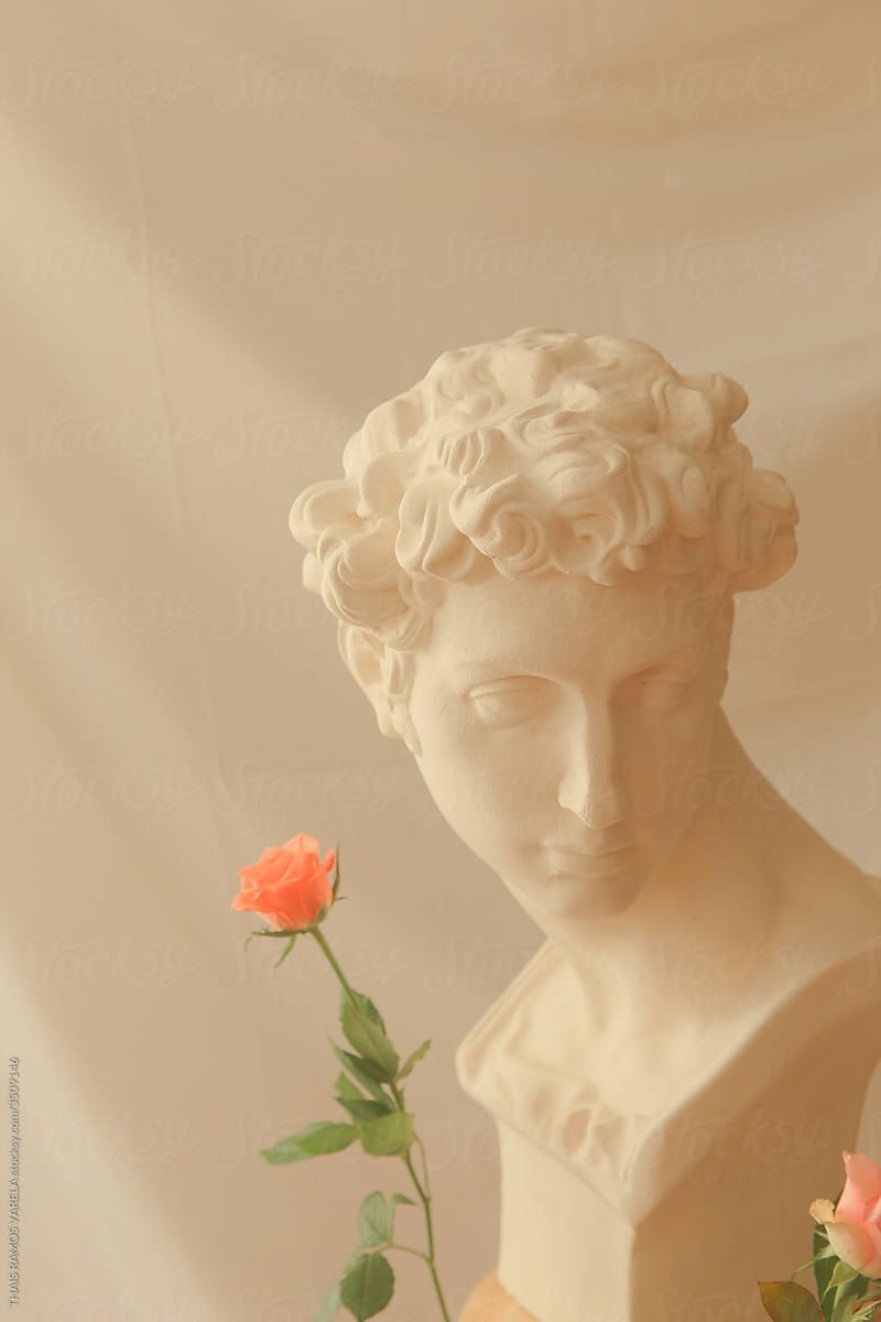 Greek Statue And Roses. VARELA