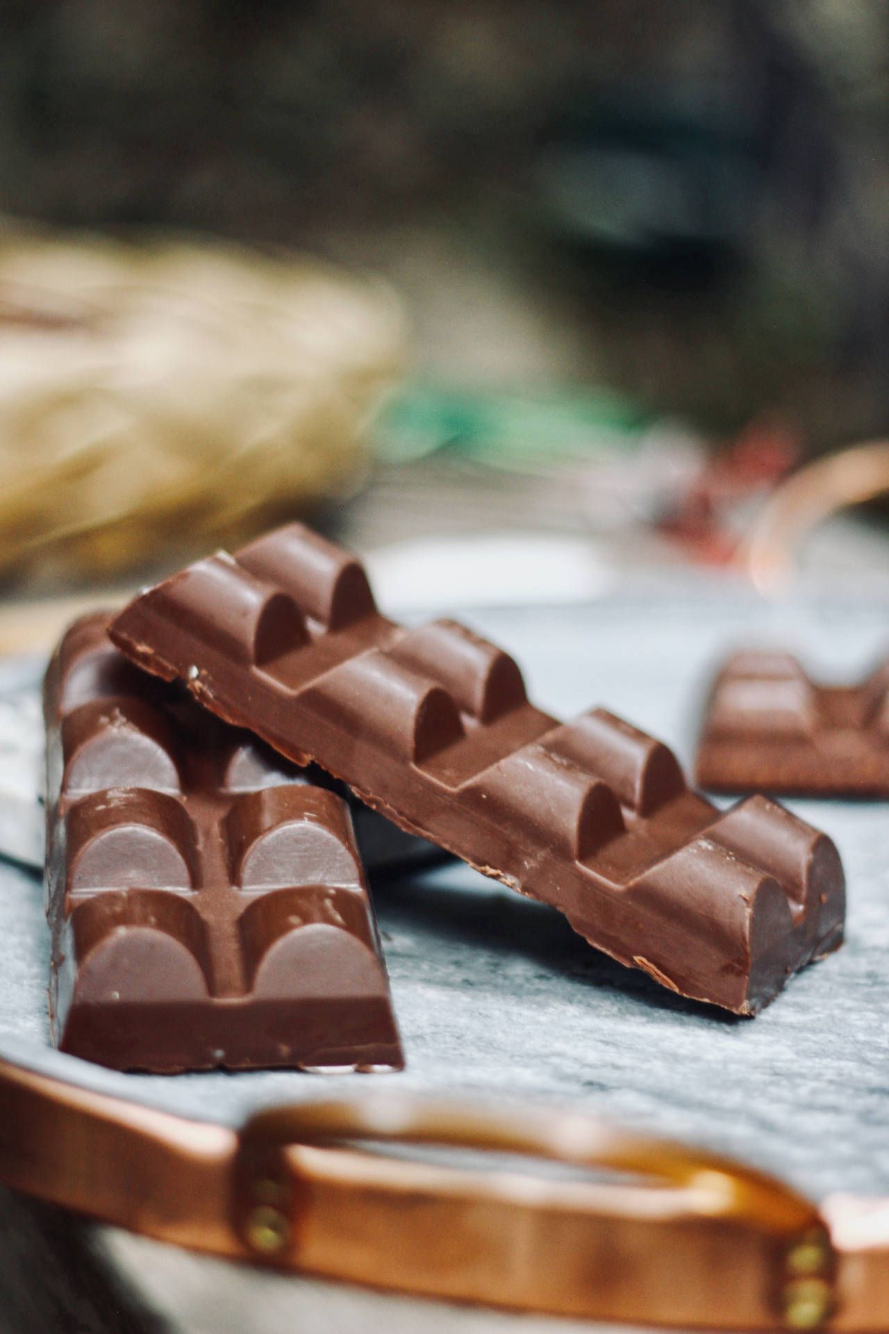 Two chocolate bars on a table - Chocolate