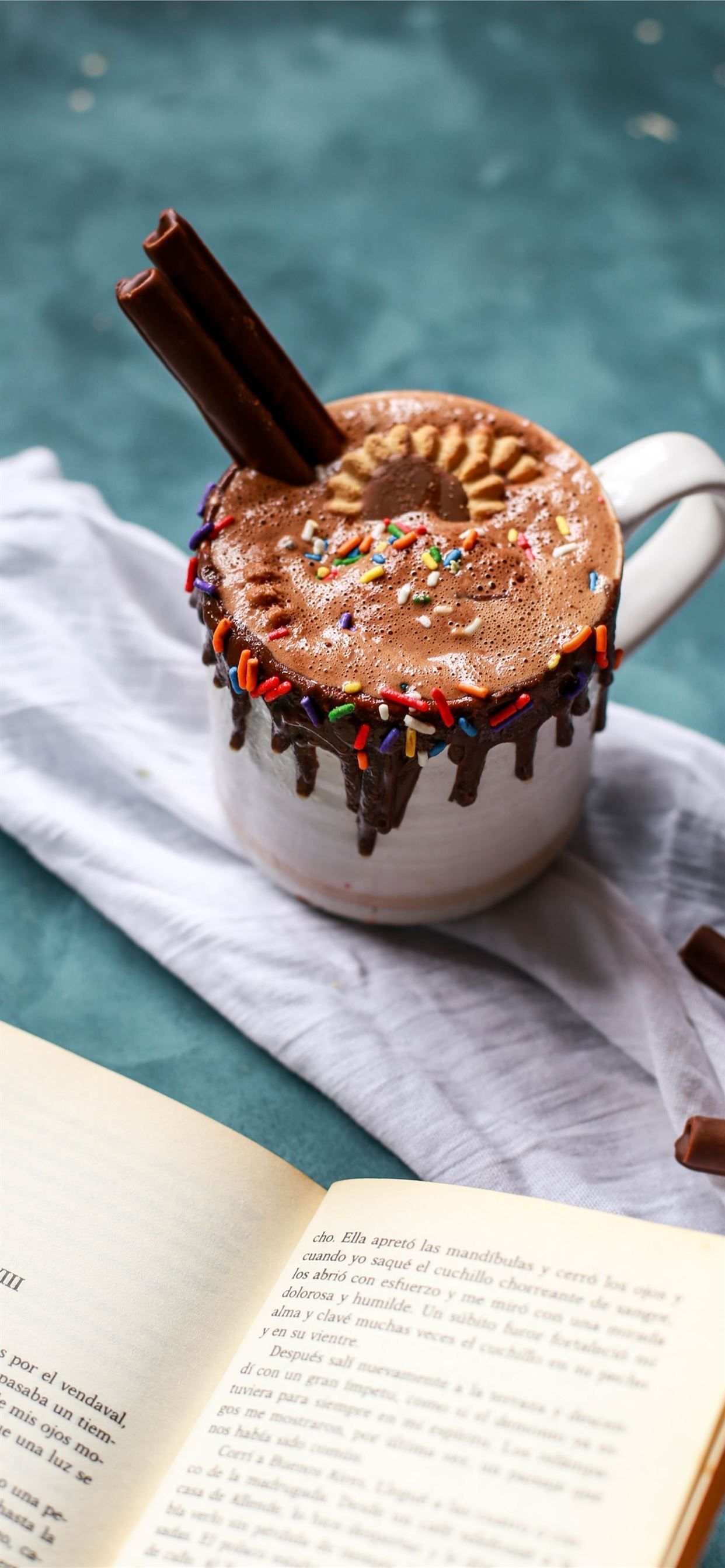 A book open to page 34 with a cup of hot chocolate on top of it - Chocolate