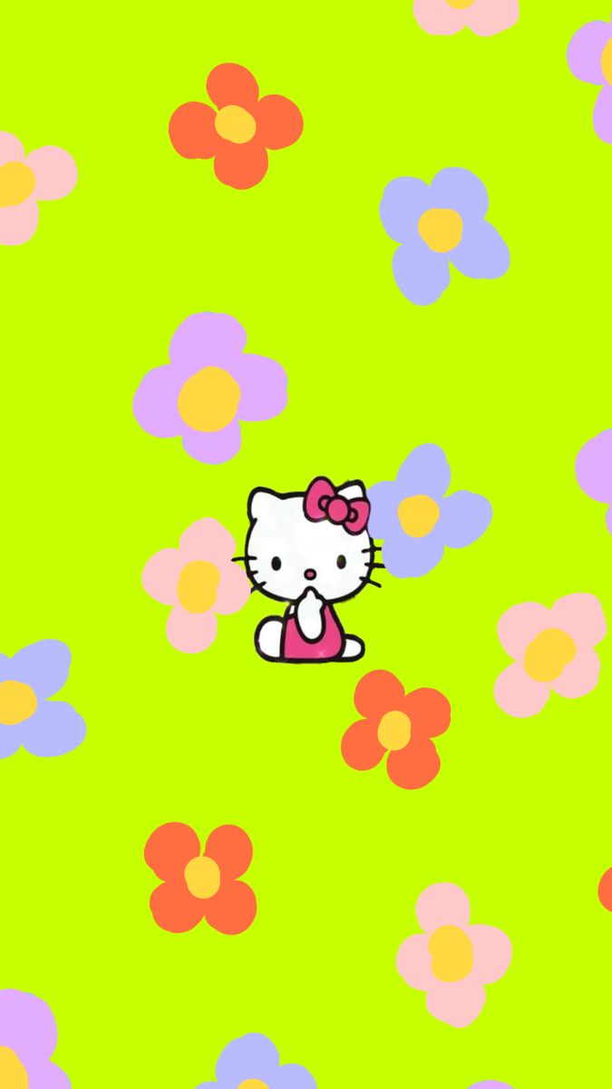 A hello kitty sitting in the middle of flowers - Hello Kitty