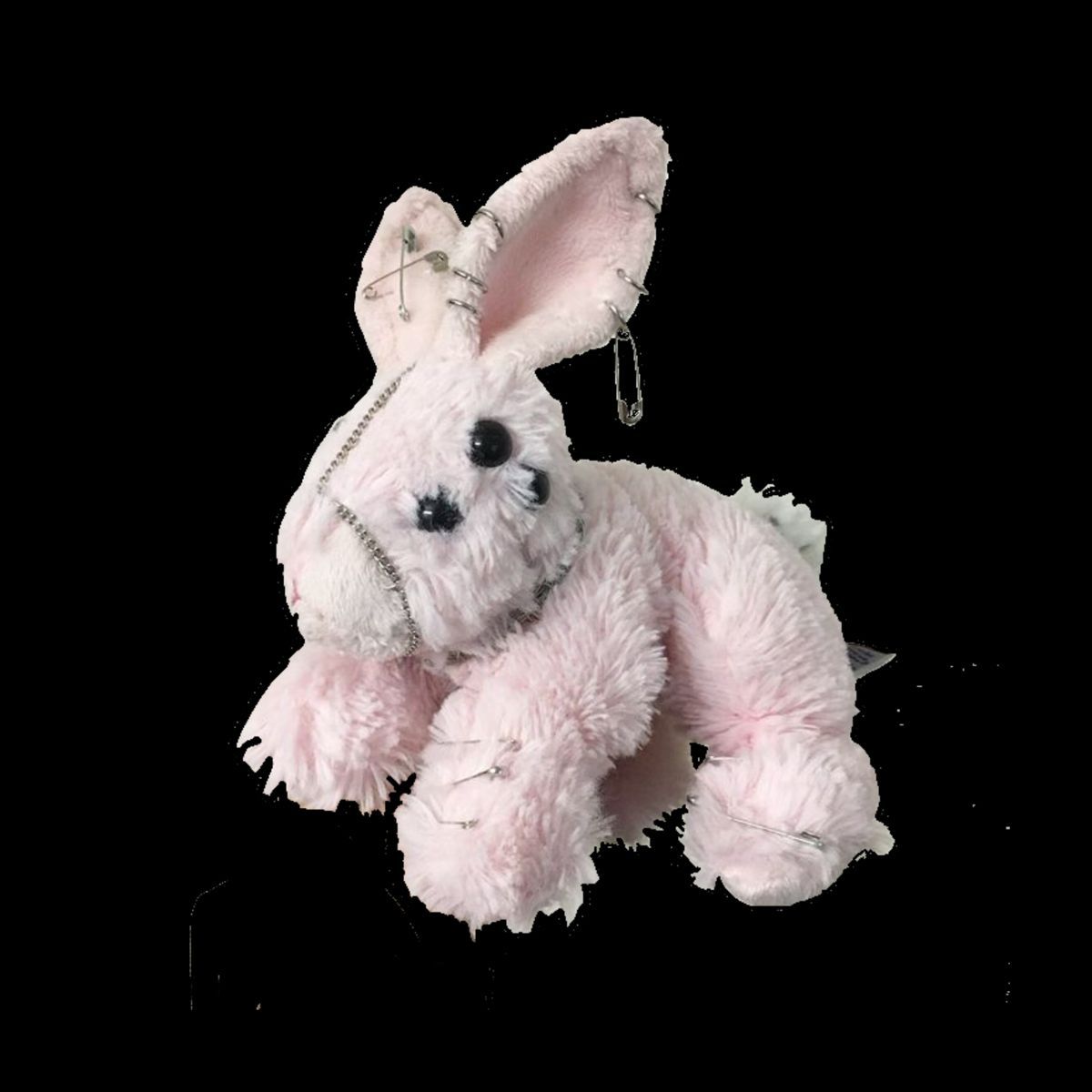 A pink stuffed animal rabbit with a zipper for a mouth. - Traumacore