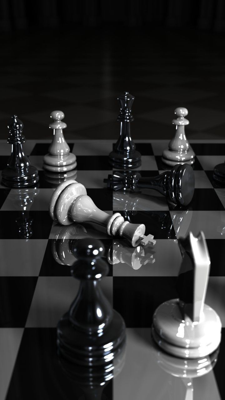 A chessboard with a king and a pawn knocked over. - Chess