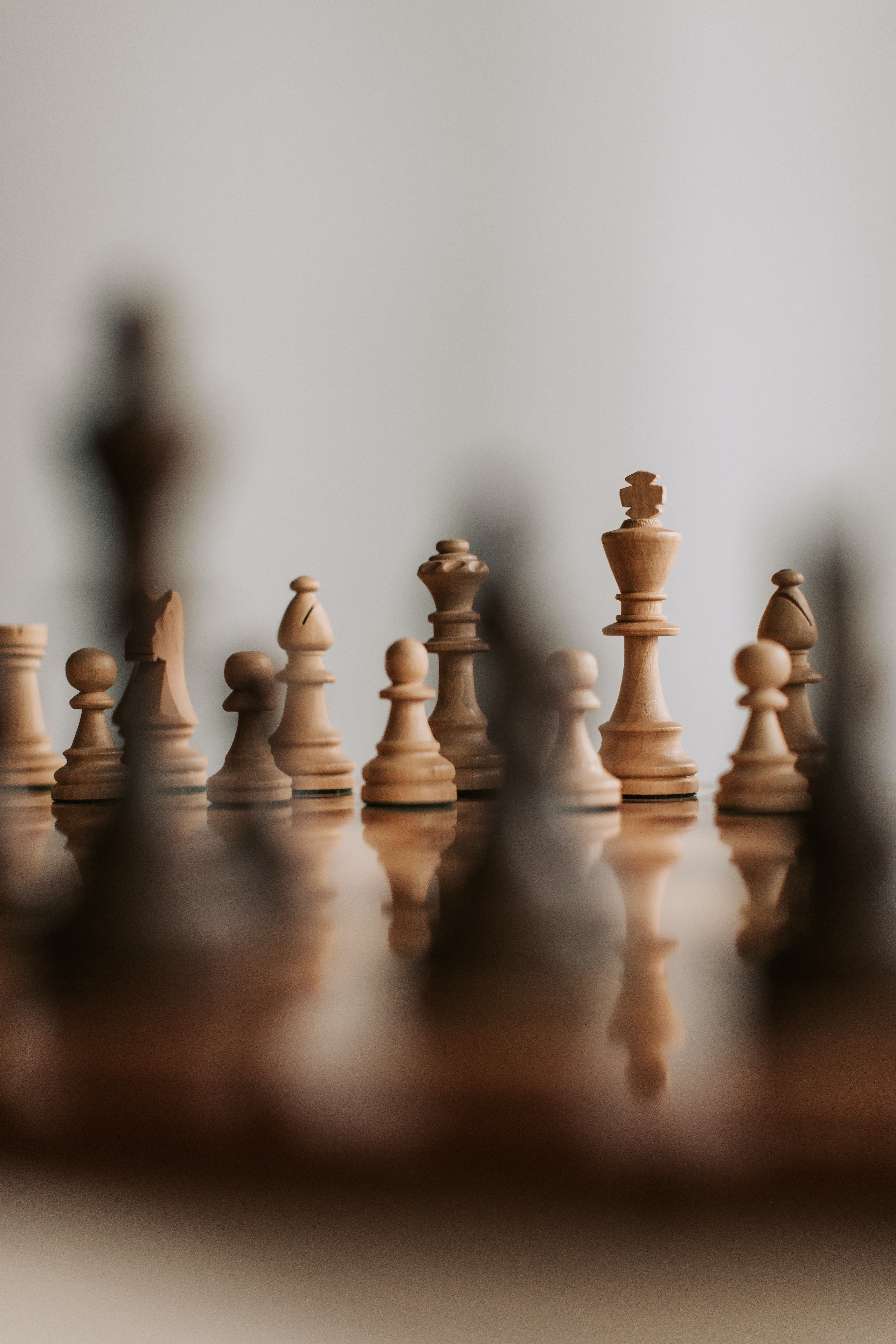 A chess board with a blurred background - Chess