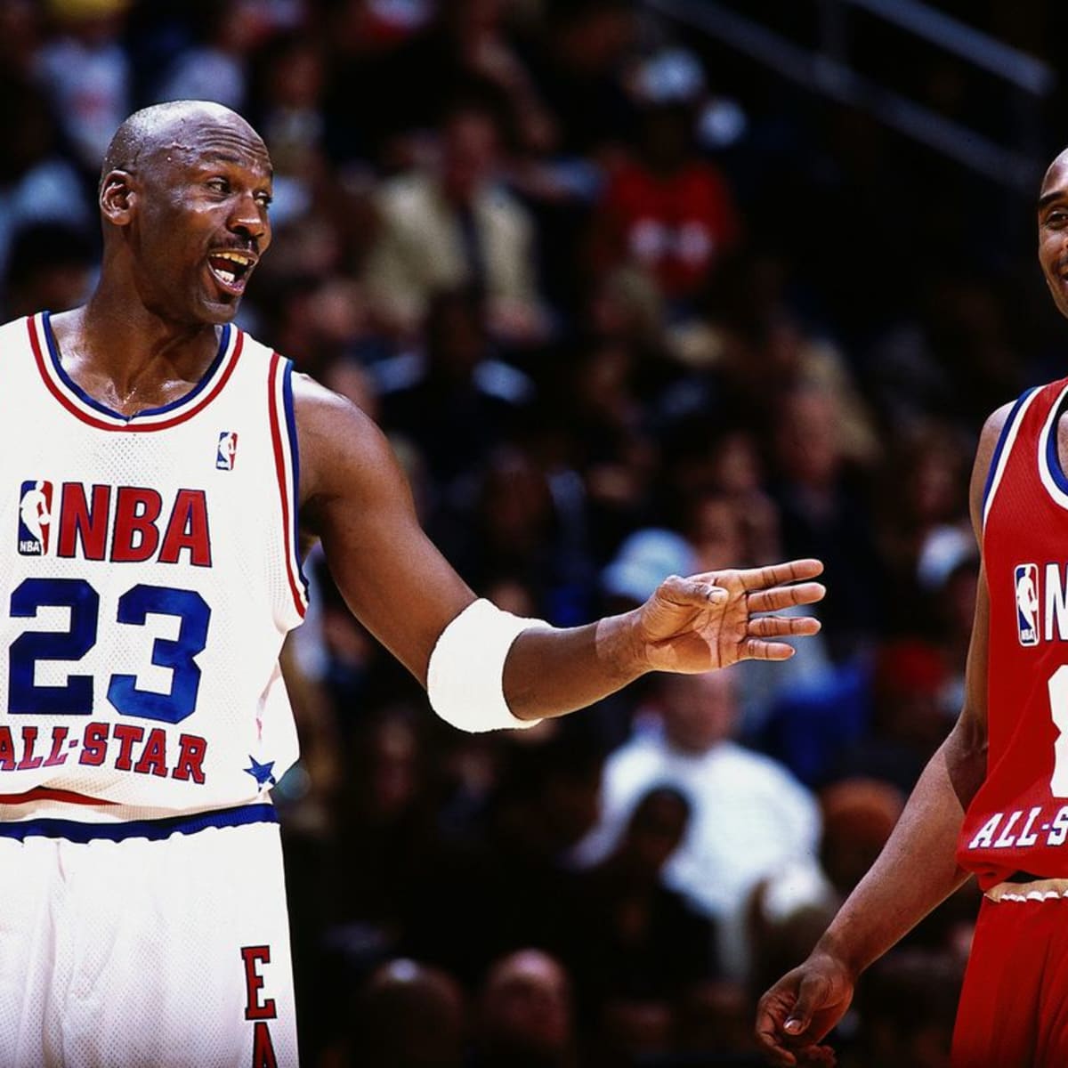 Michael Jordan and Scottie Pippen of the Chicago Bulls talk during an NBA All-Star game in 1992. - Michael Jordan, Kobe Bryant