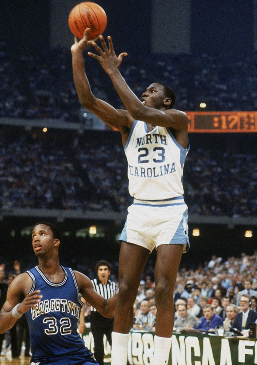 North Carolina's Michael Jordan goes up for a shot against Georgetown's John Thompson during the first half of the NCAA championship game in New Orleans on April 2, 1982. - Michael Jordan