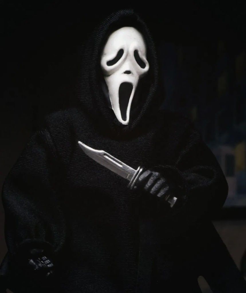 A NECA action figure of Ghostface from the Scream movie franchise. - Ghostface