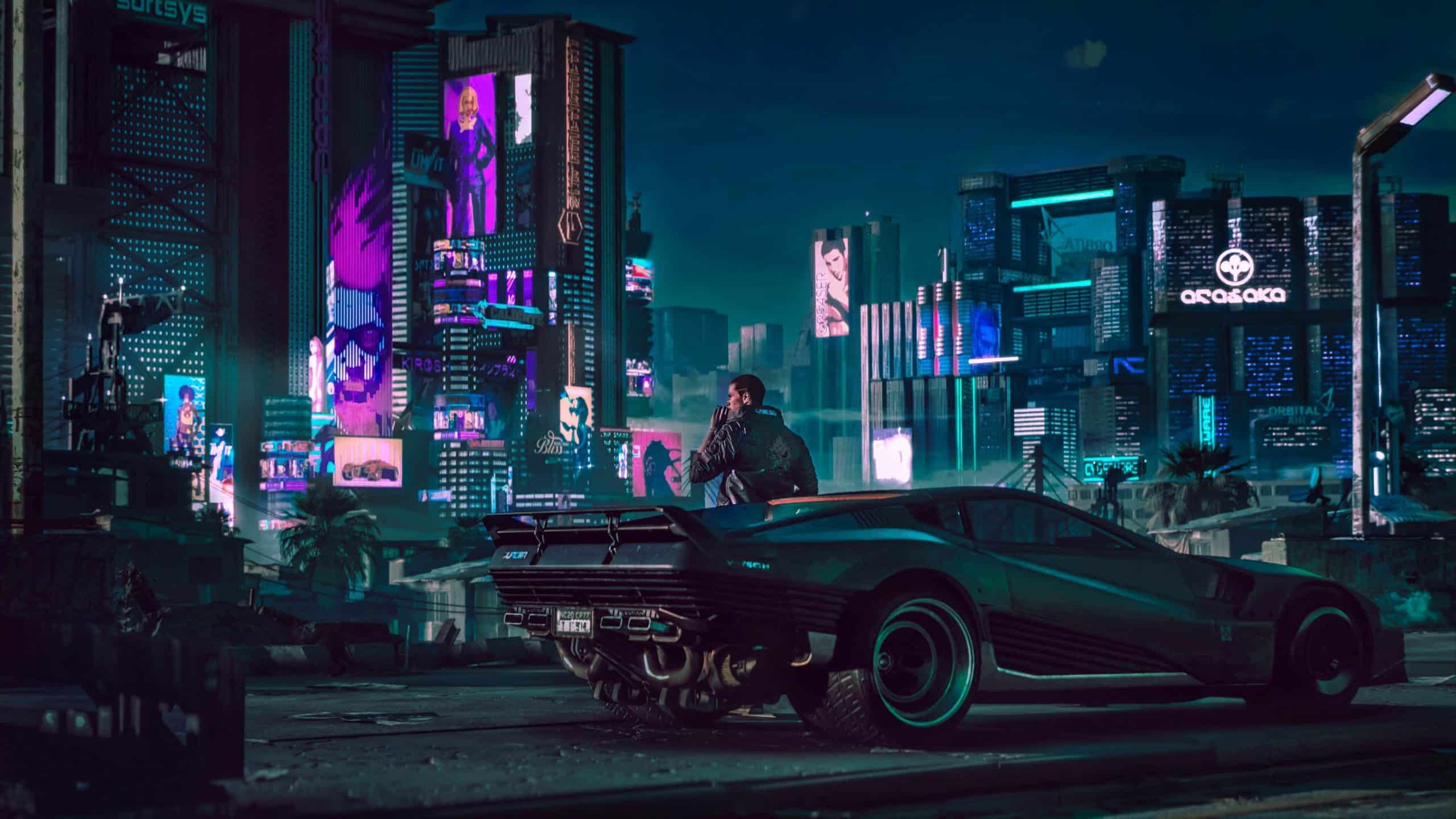 A Cyberpunk 2077 wallpaper of a man standing in front of a futuristic city at night. - Cyberpunk 2077