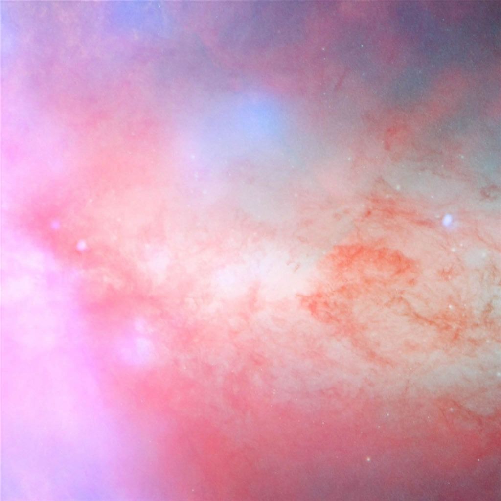 A close up of a nebula with a pink and blue color scheme - Blush