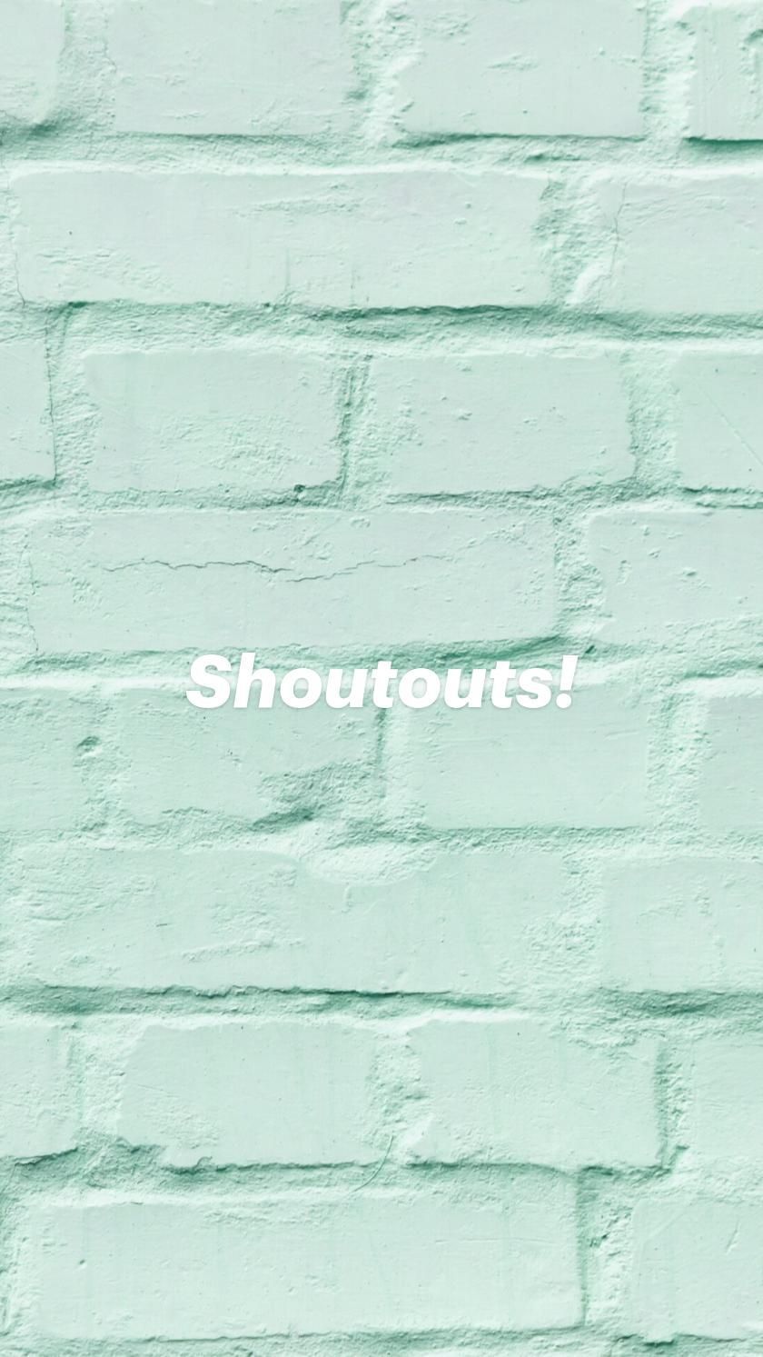 Mint green brick wall background with the text 