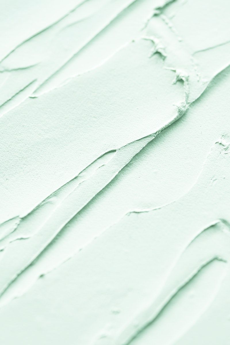 Mint green wall paint textured