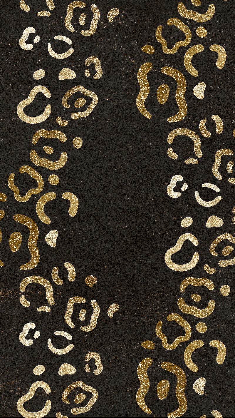 A black rug with a gold glitter leopard print border - Leopard