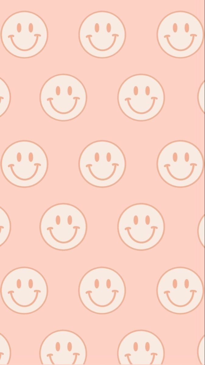 A phone wallpaper with a pattern of pastel pink and white smiley faces on a pink background - Smiley