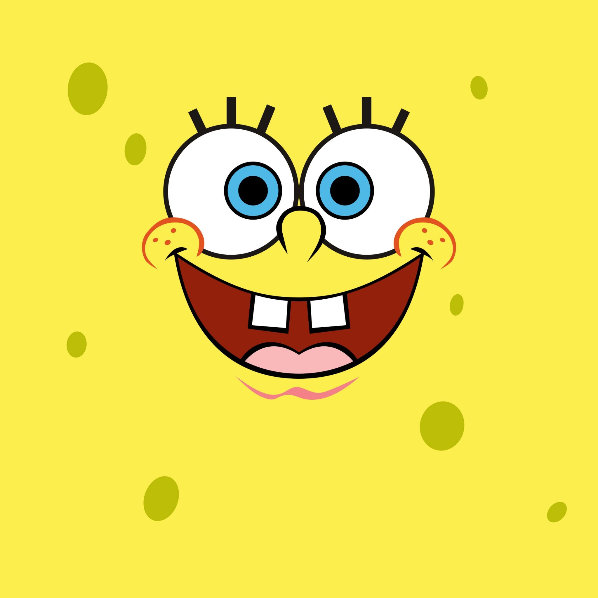 A picture of SpongeBob SquarePants with a huge smile on his face. - Smiley