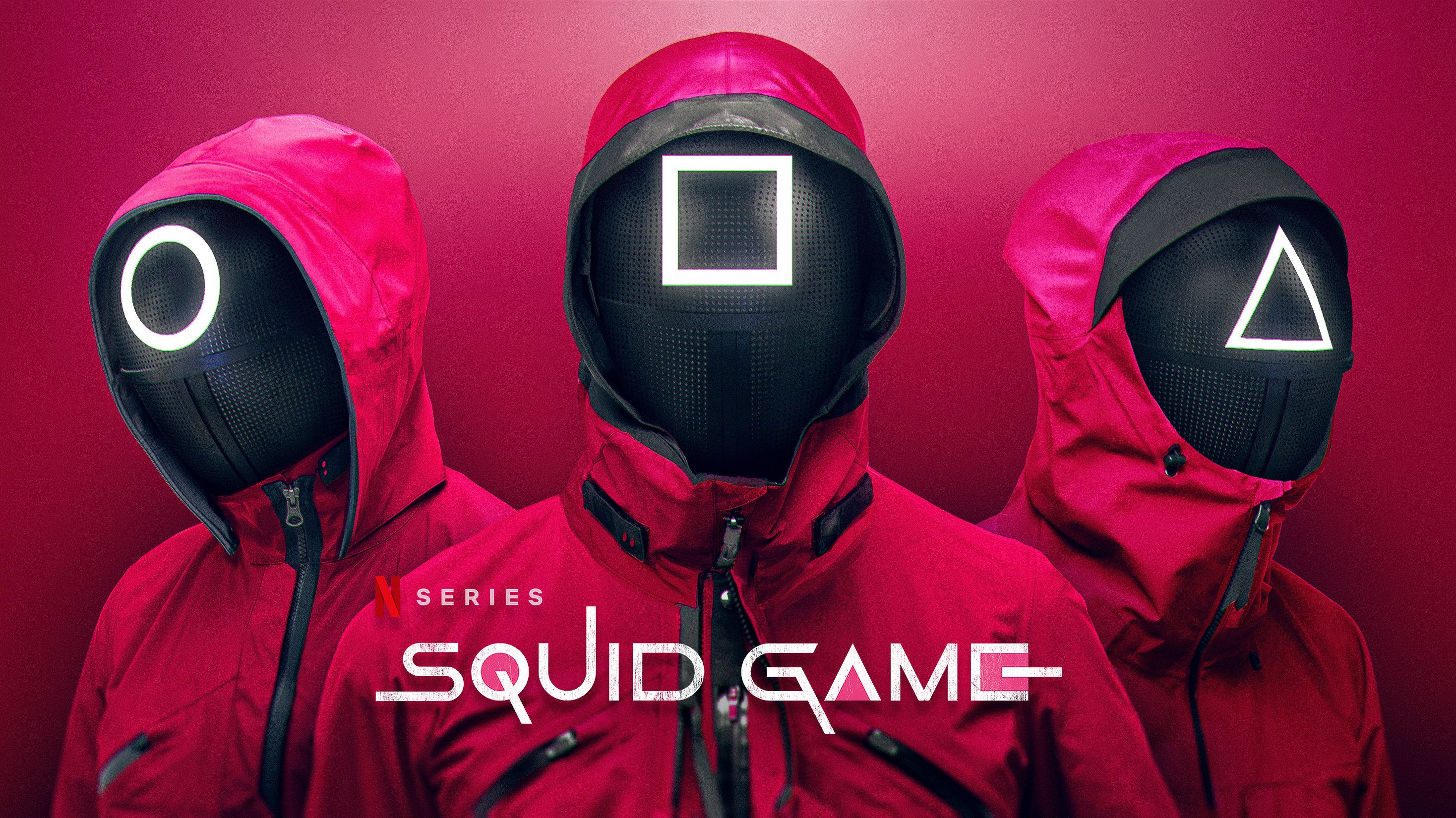 A red background with three people wearing red parkas with black helmets on that have a white circle, square, and triangle on them. - Squid Game